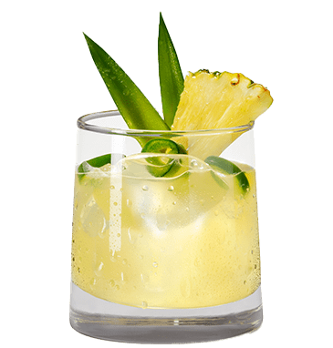 A short glass with a yellow margarita inside, garnished with pineapple and jalapeño