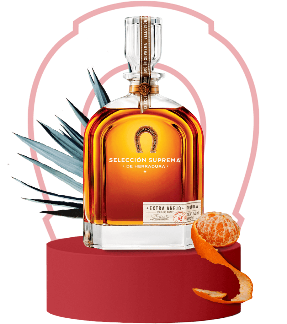 An image of a bottle of Herradura Seleccion Suprema on an red platform surrounded by flavor notes of agave and mandarin.